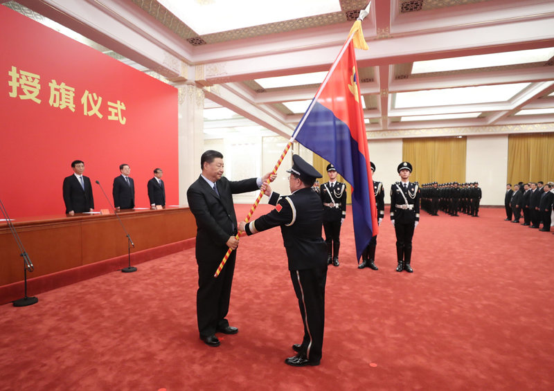 习近平向警察队伍授旗并致训词在公安系统引起强烈反响