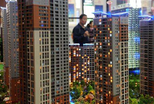 沪深两地重拳出击为楼市“退烧”