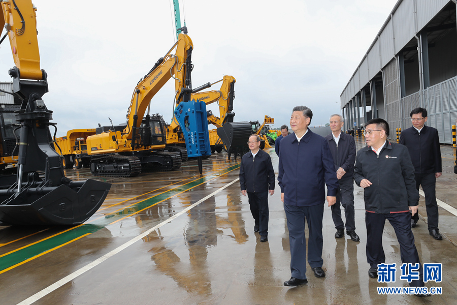 习近平：建设新时代中国特色社会主义壮美广西